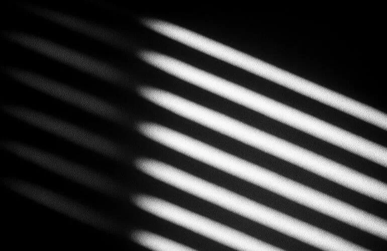 Black and white photography with strong tonal contrast using light and shadows