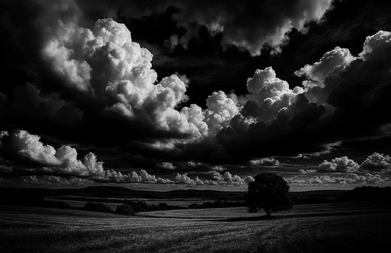 Black and white photography landscape with dramatic clouds using filter effect