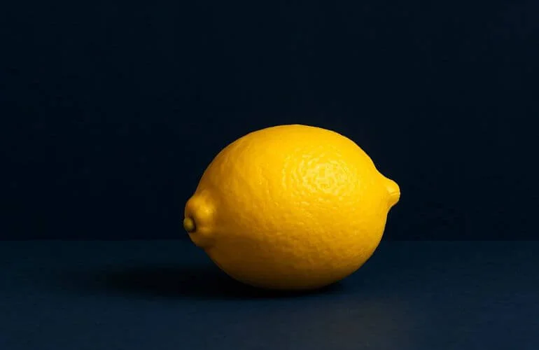 Vivid yellow object placed before dark navy background to emphasize contrast