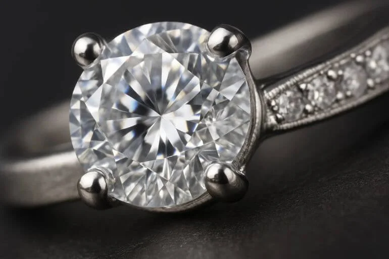 Close-up of ring showing intricate jewelry details