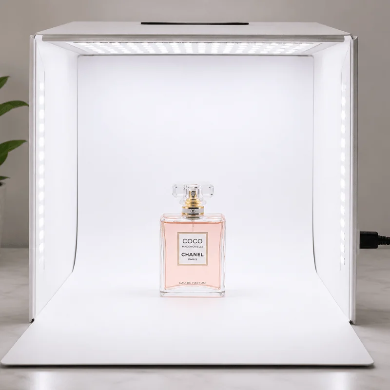 Lightbox setup with perfume bottle for small product white background photography at home