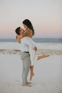 beach couple poses