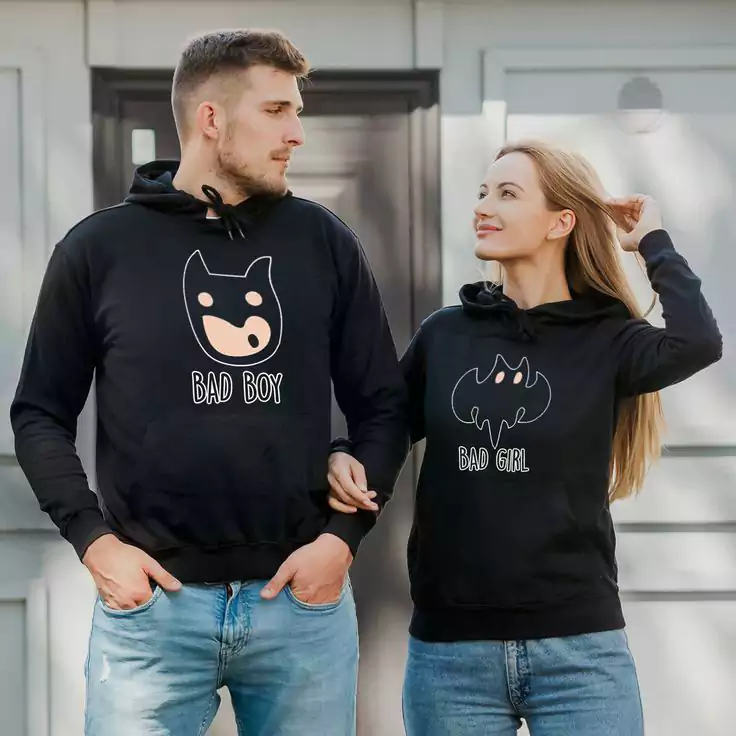 Couple Wearing The Same Jumpers 