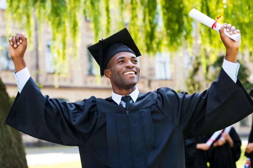 Holding a Sign that Says Finally Graduated
