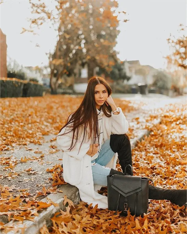 sitting on a leaf covered place