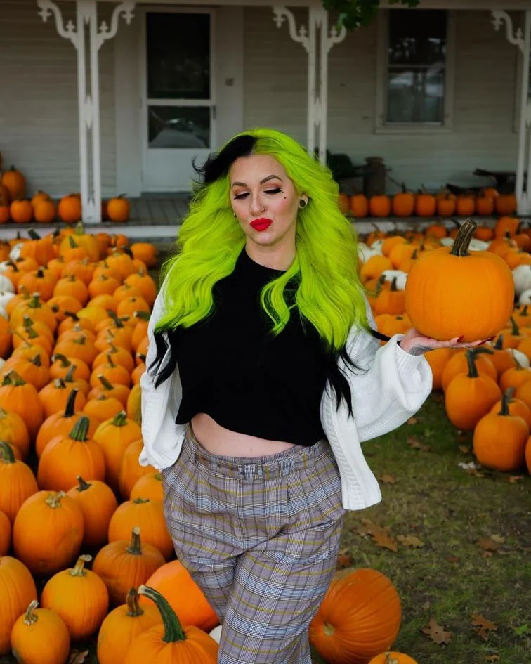 surrounded with pumpkins