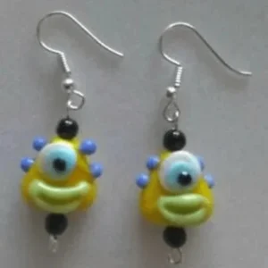 one eyed monster clown earrings gold