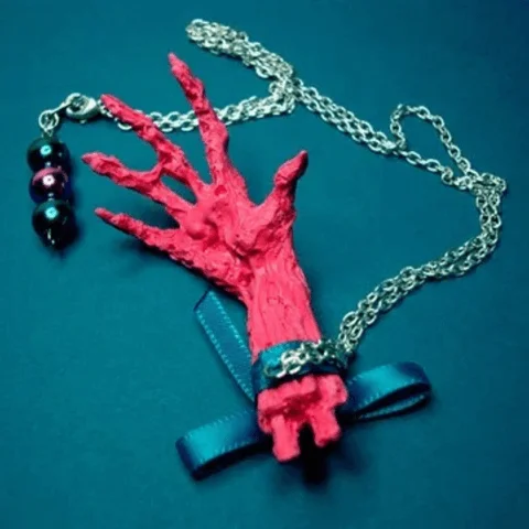 pink mummy hand locket
