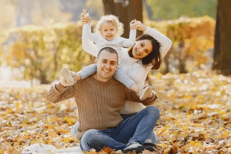 happy family in autumn park